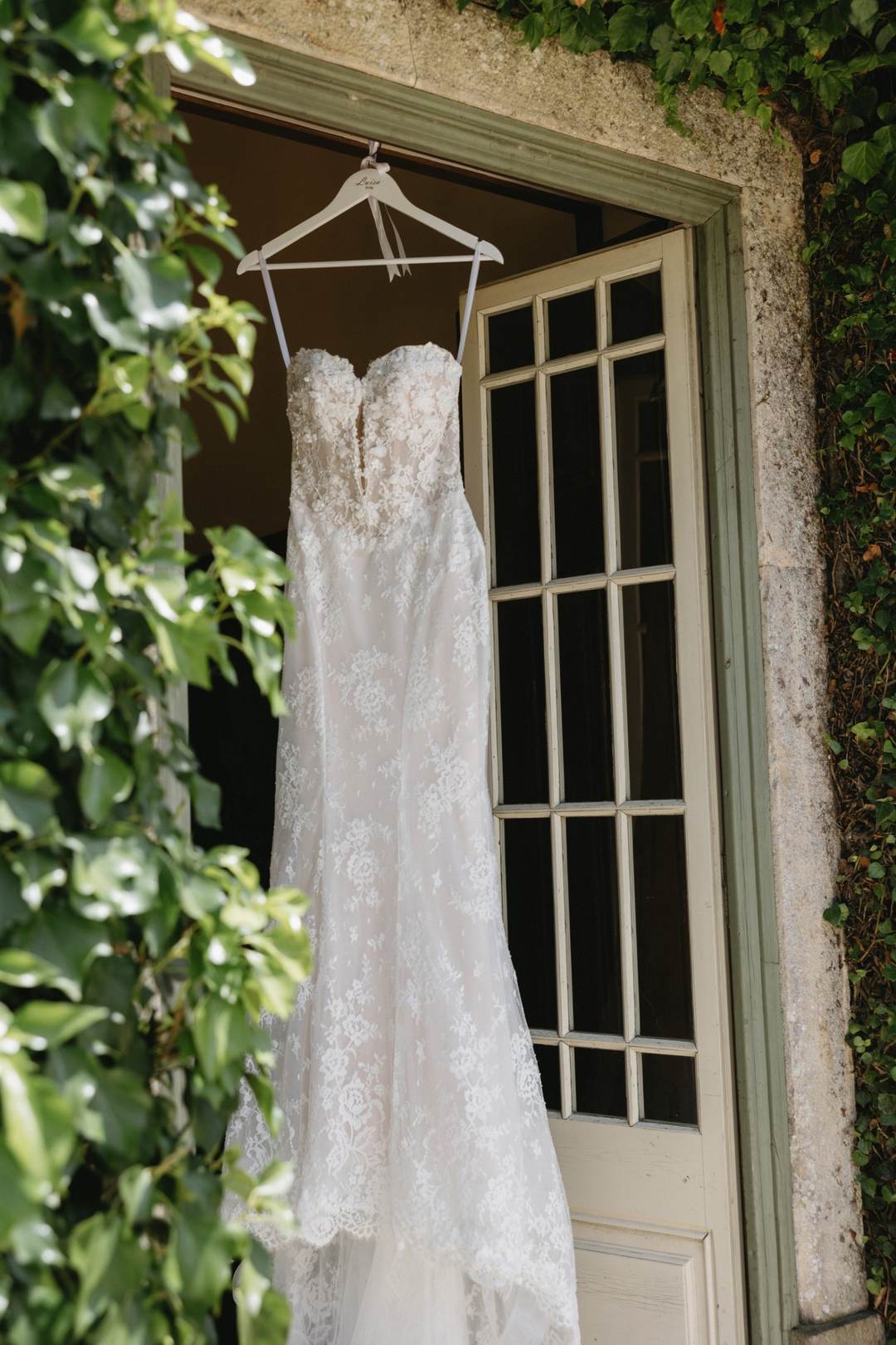 Real Bride Luisa in Wade sparkly off shoulder fit and flare lace wedding dress with detachable sleeves