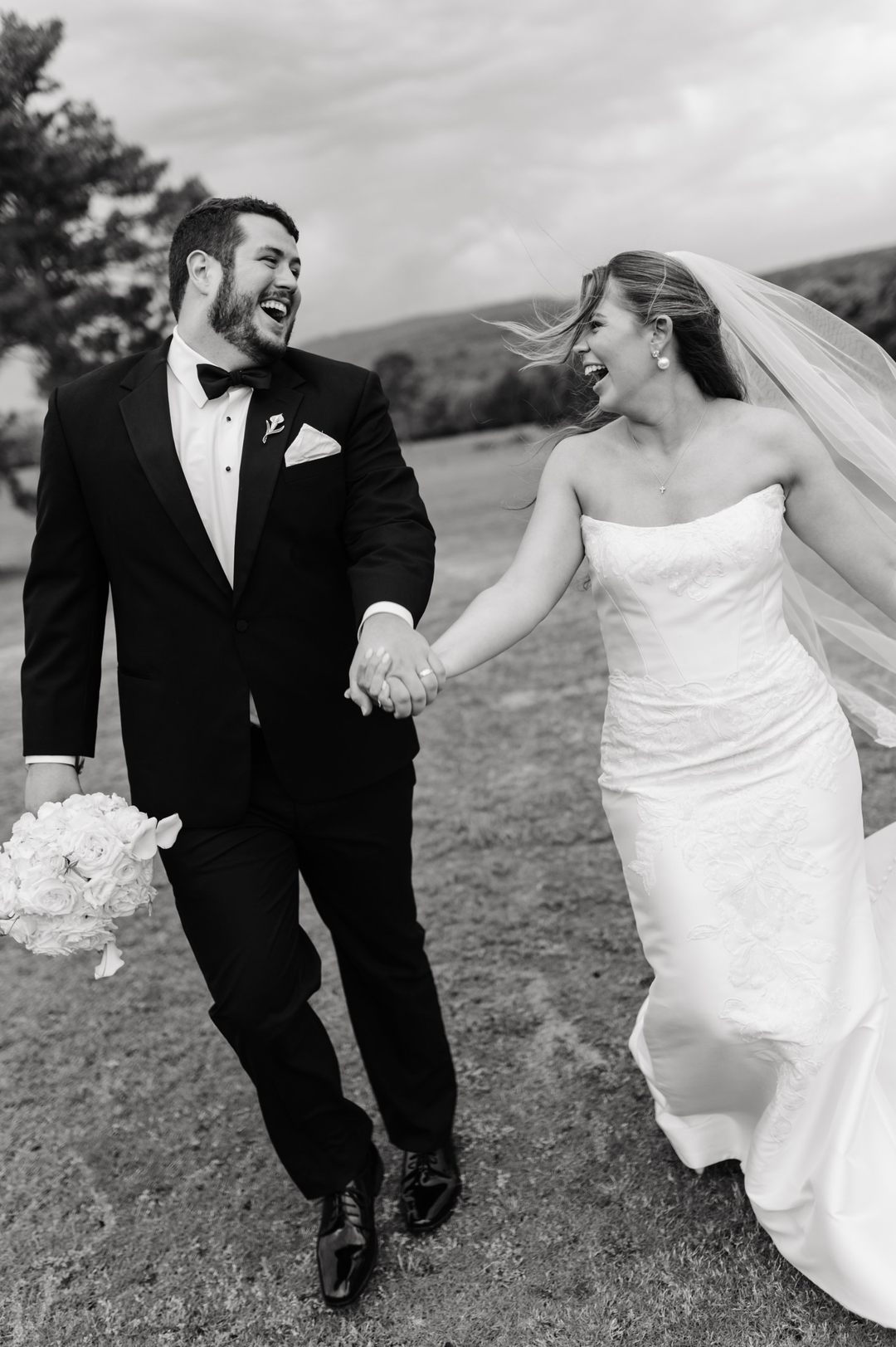 real bride lily in woodrow satin fit and flare sheath strapless wedding dress with lace detail and detachable overskirt